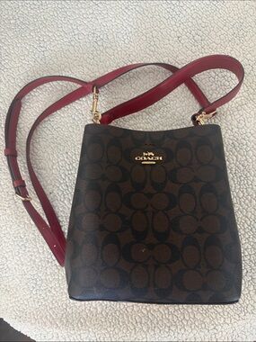 Coach Brown Signature Canvas Crossbody with Red Strap and Gold Hardware